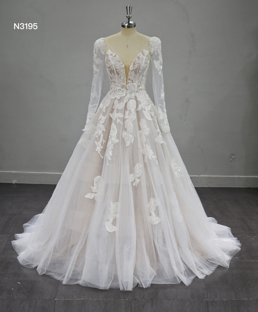 Nihara - Long sleeve organza ball gown with large beaded lace